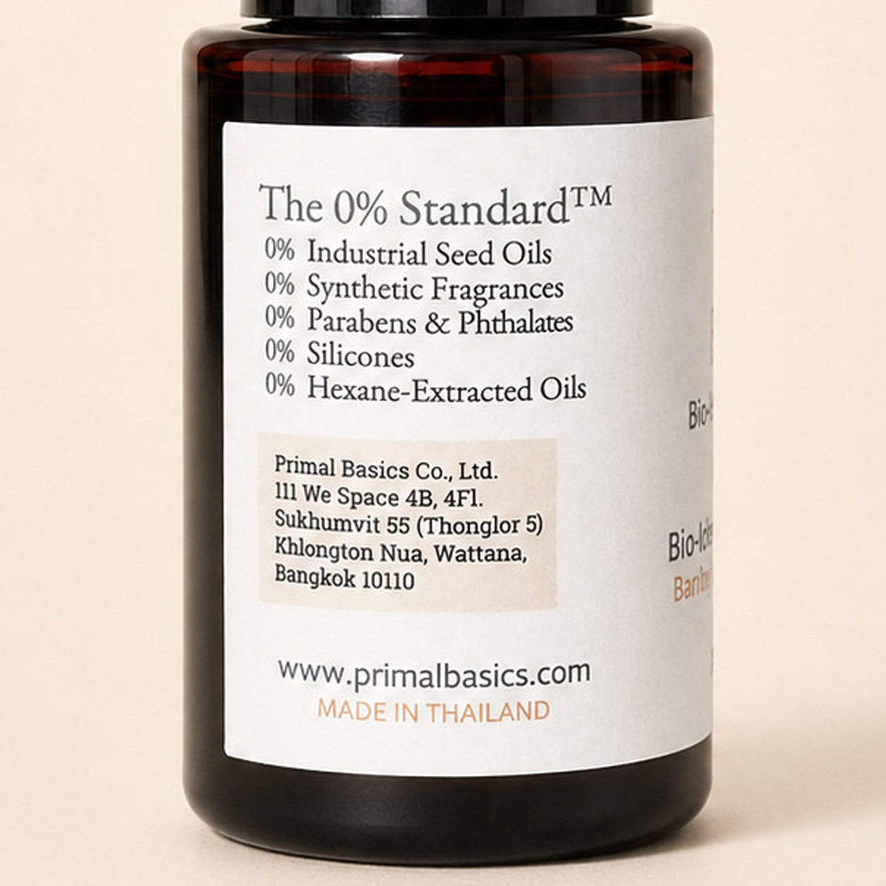 Bio Gold back label zoom — The 0% Standard exclusions and Primal Basics company details