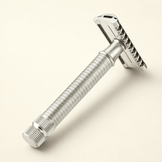 PrimalGlide Apex Pro razor — weighted stainless-steel double-edge handle, front view