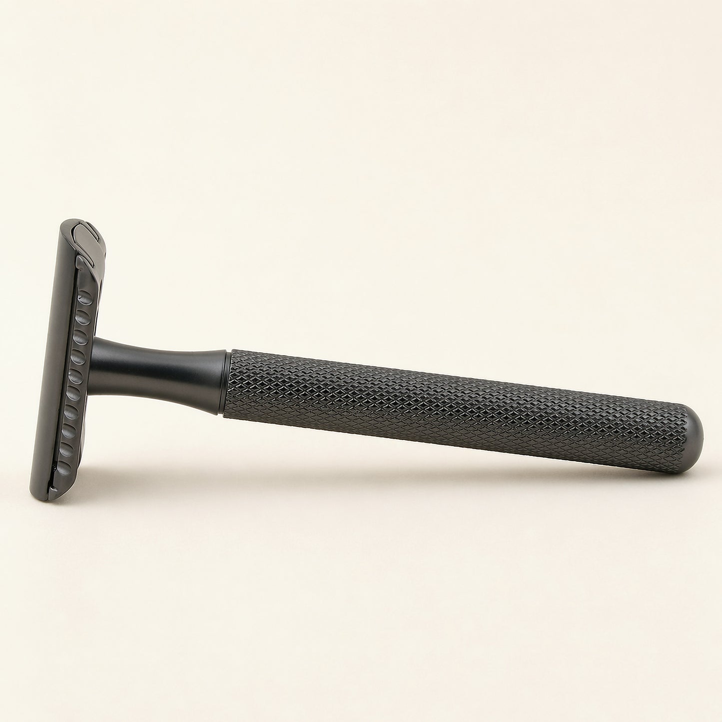 PrimalGlide Essential razor — stainless steel handle, zinc alloy head, front view