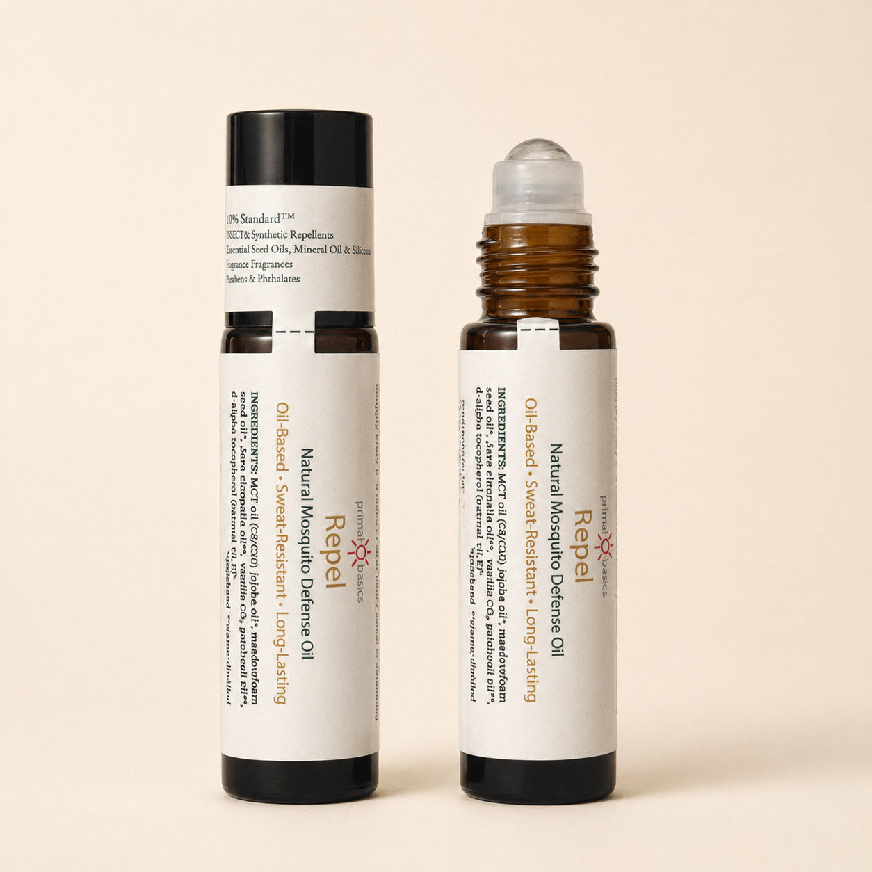 Repel — Mosquito Defense Oil 10ml roller bottle, two bottles showing cap on with The 0% Standard and roller exposed